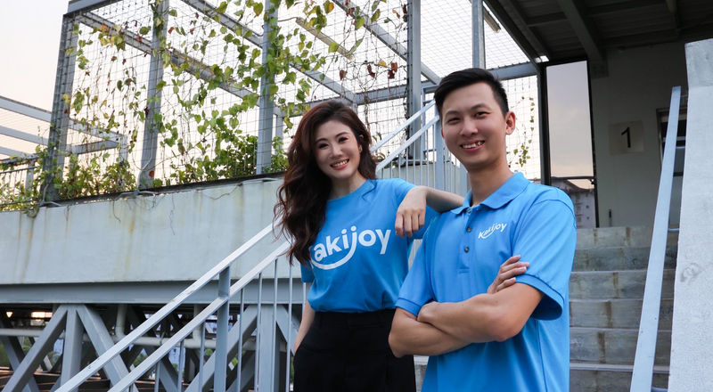 KakiJoy team in branded shirts