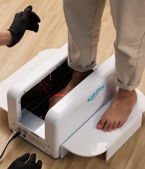 3D foot scanner in action with a customer stepping onto it